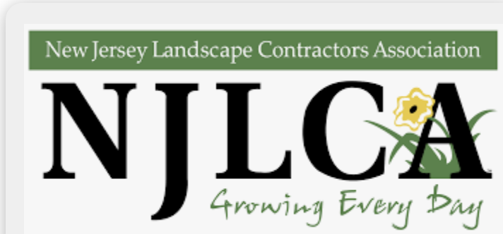 A logo for the valley landscape contractors group.